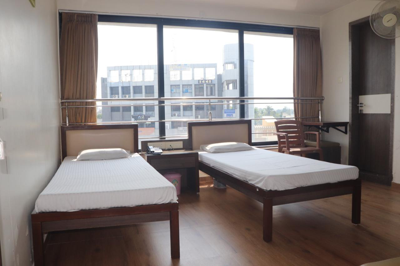Clean and comfortable patient accommodation room at Brahma Ayurveda
